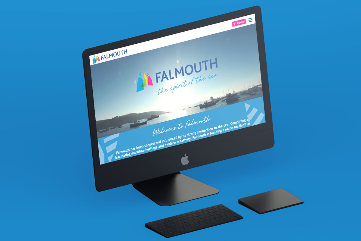 The Falmouth website is displayed on a PC. The design and build of the Website were done by Oracle Design.