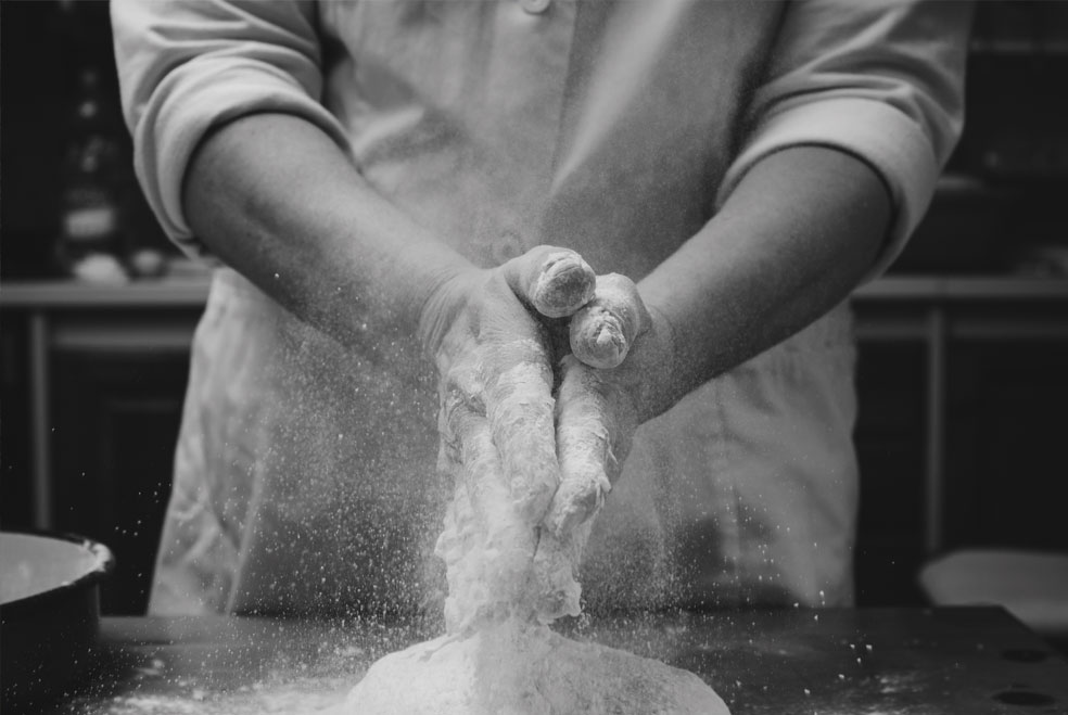 a person making dough
